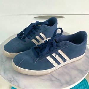 Blue white and gold adidas sneakers